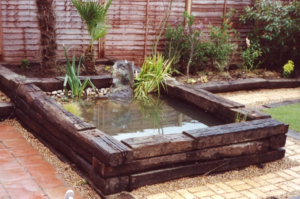 Raised sleepers pondSimple pond made with recycled railway sleepers in